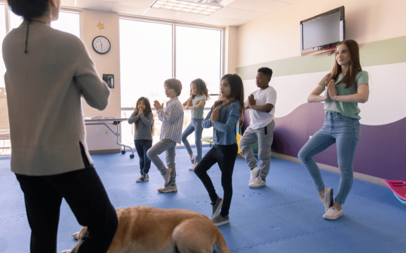 children doing experiential therapy with therapist at the center for child protection